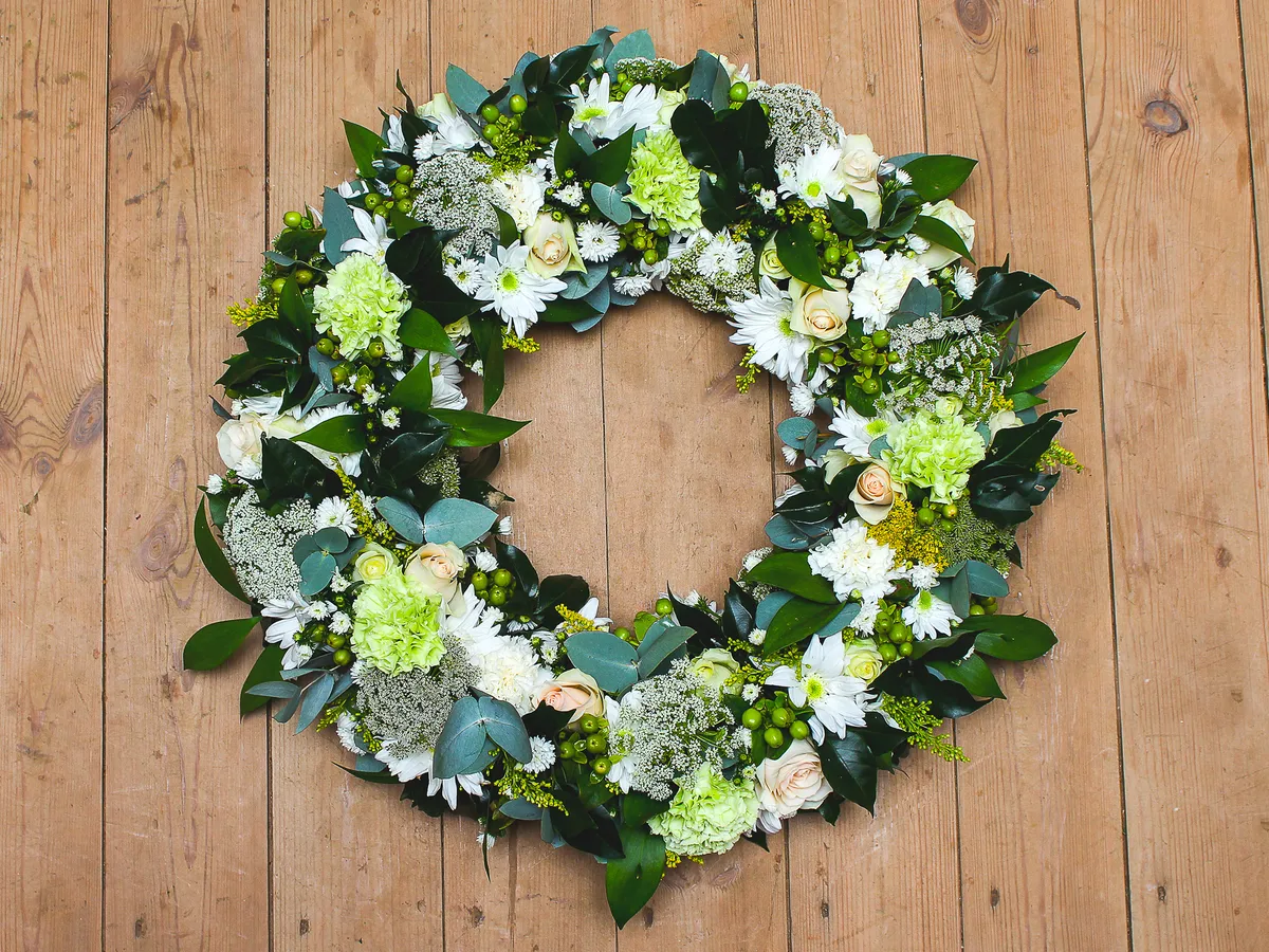 A white and green wreath